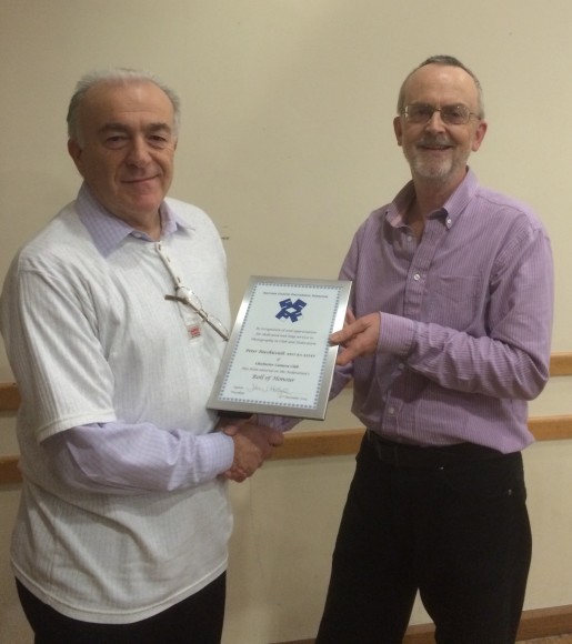 Peter Rocchiccioli receives his Roll of Honour from Glyn Edmunds