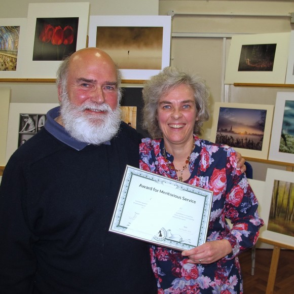 Caroline Colegate ARPS receives her certificate of an awarded APAGB from Leo Rich