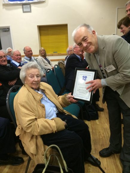 Peter Rocchiccioli Vice President of the SCPF presenting a framed Certificate to Jeanne Bevis Chichester Camera Club President The SCPF Roll of honour certificate.